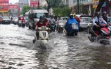 [ẢNH] Những kỹ năng lái xe an toàn khi trời mưa, ngập úng